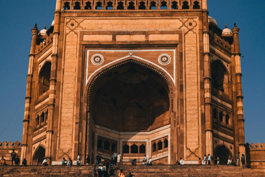 View of the Taj Mahal during sunrise from the eastern banks of the River Yamuna, showcasing its architectural beauty as part of the Agra overnight tour with Fatehpur Sikri.